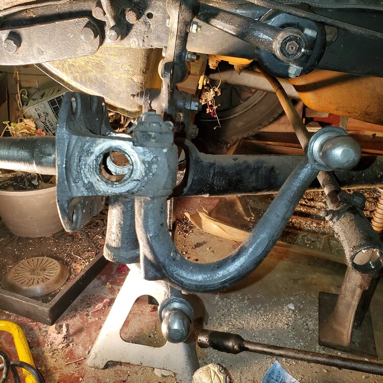 spindle and steering arm removed from axle .jpg